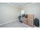 Cozy carpeted room with neutral paint, crown molding, one window, and empty for you to add your personal touch at 5008 Bowles Dr, Summerville, SC 29485