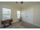 Neutral carpeted room with neutral paint, 2 windows, and a large closet for you to add your personal touch at 5008 Bowles Dr, Summerville, SC 29485