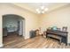 Living room with hardwood floors, an elegant china cabinet, and a piano at 5008 Bowles Dr, Summerville, SC 29485