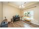 Living room with wood floors, modern lighting, piano and plant display at 5008 Bowles Dr, Summerville, SC 29485