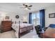 Inviting bedroom showcasing a bed with decorative frame and a classic wooden dresser at 523 Fern Tree Dr, Summerville, SC 29486