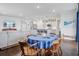Bright, open-concept living space featuring dining area and modern kitchen with stainless steel appliances at 523 Fern Tree Dr, Summerville, SC 29486