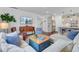 Open-concept living space with hardwood floors, comfortable seating, and seamless flow to the kitchen at 523 Fern Tree Dr, Summerville, SC 29486