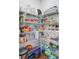 Organized walk-in pantry with wire shelving stocked with various food items and kitchen essentials at 523 Fern Tree Dr, Summerville, SC 29486