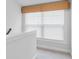 Bright natural light filters through the blinds of the window at the top of the stairs at 523 Fern Tree Dr, Summerville, SC 29486