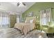 Cozy bedroom with decorative wood floors, vaulted ceilings, and ample natural light at 5401 Diston Court, North Charleston, SC 29420