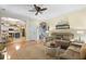 Open concept living room flows into the kitchen, providing ample seating and natural light at 5401 Diston Court, North Charleston, SC 29420