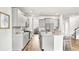Modern kitchen features gray cabinets, stainless steel appliances, and an island with counter seating at 549 Richfield Way Way, Summerville, SC 29486