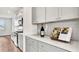 Bright kitchen featuring white countertops and subway tile backsplash, alongside modern appliances at 549 Richfield Way Way, Summerville, SC 29486