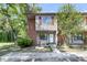 Charming two-story home with red shutters and a landscaped front yard, with a welcoming front porch at 565 Travelers Blvd, Summerville, SC 29485