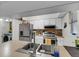 A kitchen featuring stainless steel appliances, white cabinets and a tiled backsplash at 565 Travelers Blvd, Summerville, SC 29485
