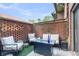 Back patio with comfortable seating area, perfect for outdoor relaxation and entertaining guests at 565 Travelers Blvd, Summerville, SC 29485