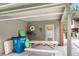 Pool house featuring seating, trash receptacle, and posted safety information at 565 Travelers Blvd, Summerville, SC 29485