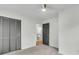 Open bedroom with view to en-suite bathroom and large, louvered closet at 5817 Canterbury Dr, Hanahan, SC 29410