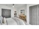 Bedroom featuring large closet, coastal decor, and view to hall and bath at 5817 Canterbury Dr, Hanahan, SC 29410