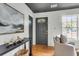 An entryway displaying hardwood floors, neutral walls, and stylish console table at 5817 Canterbury Dr, Hanahan, SC 29410