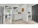Bright, open kitchen offers seamless access to the living room and a view of the bedroom at 5817 Canterbury Dr, Hanahan, SC 29410