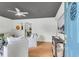 Bright, neutral living room featuring a modern ceiling fan and hardwood floors that enhances its appeal at 5817 Canterbury Dr, Hanahan, SC 29410