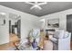 Inviting living room with hardwood floors, neutral tones, and seamless access to kitchen at 5817 Canterbury Dr, Hanahan, SC 29410