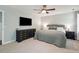 Cozy bedroom with a bed, TV, dresser, and two bedside tables at 667 Shortwood St, Charleston, SC 29412