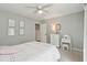 Cozy bedroom with light walls, comfortable bed, and vanity at 667 Shortwood St, Charleston, SC 29412