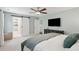 Bedroom featuring barn door to bathroom, TV and plenty of closet space at 667 Shortwood St, Charleston, SC 29412