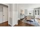 Elegant dining room showcasing a stylish table setting and a decorative display cabinet at 667 Shortwood St, Charleston, SC 29412