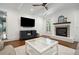 Living room featuring a fireplace and mounted TV at 667 Shortwood St, Charleston, SC 29412