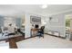 Inviting home office space with ample natural light and neutral decor at 667 Shortwood St, Charleston, SC 29412