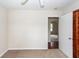 Cozy bedroom with ceiling fan and a view to another room at 7655 Ovaldale Dr, North Charleston, SC 29418