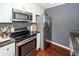 Well-equipped kitchen with stainless steel appliances and granite countertops at 7655 Ovaldale Dr, North Charleston, SC 29418