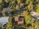 Stunning aerial view of the estate showing proximity to a guest house and lush landscaping at 7897 Russell Creek Dr, Edisto Island, SC 29438