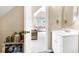 A bathroom with a white vanity and a view into the bedroom at 7897 Russell Creek Dr, Edisto Island, SC 29438