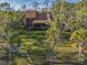 Beautiful home exterior surrounded by lush greenery and a well-maintained lawn, offering a serene setting at 7897 Russell Creek Dr, Edisto Island, SC 29438
