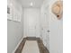 Bright hallway with a neutral color palette and hardwood flooring at 5577 Ruby Falls Dr, North Charleston, SC 29420