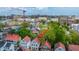 Scenic aerial view of a neighborhood with red rooftops, pointing to the subject property at 9 Bogard St # 3, Charleston, SC 29403