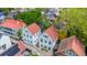 Charming neighborhood featuring colorful houses with red rooftops and mature trees at 9 Bogard St # 3, Charleston, SC 29403