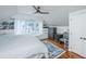 Bedroom with a cozy window seat, hardwood floors, and built-in shelves at 9 Bogard St # 3, Charleston, SC 29403
