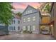 Charming home featuring a two-story design with a gravel driveway and a covered parking area at 9 Bogard St # 3, Charleston, SC 29403