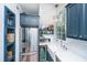 Well-equipped kitchen with stainless steel appliances, undermount lighting, and convenient shelving at 9 Bogard St # 3, Charleston, SC 29403