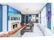 Inviting living room with a fireplace, TV, stylish furniture, and hardwood floors at 9 Bogard St # 3, Charleston, SC 29403