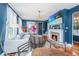 Well-appointed living space with fireplace, modern furnishings, and natural light at 9 Bogard St # 3, Charleston, SC 29403