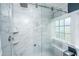 Beautiful new bathroom shower with marble tile, glass door, and modern fixtures at 9 Bogard St # 3, Charleston, SC 29403