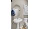 Bathroom featuring a pedestal sink, toilet, and medicine cabinet at 9676 Godwin St, Ladson, SC 29456