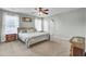 Serene bedroom with calming blue walls, plush carpet, and natural light creating a relaxing retreat at 9676 Godwin St, Ladson, SC 29456