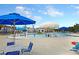Enjoy the community pool area with umbrellas, tables, and plenty of seating at 9676 Godwin St, Ladson, SC 29456