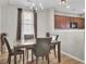 Dining room featuring a chandelier and hardwood floors at 9676 Godwin St, Ladson, SC 29456