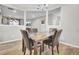 Elegant dining room showcases a marble-topped table and contemporary chandelier, perfect for Gathering gatherings at 9676 Godwin St, Ladson, SC 29456