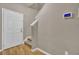 Entryway with hardwood floors, stairs, and fresh paint at 9676 Godwin St, Ladson, SC 29456