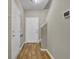Inviting entryway with hardwood floors and white doors at 9676 Godwin St, Ladson, SC 29456